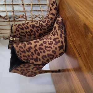 Jessica simpson high heeled print boot. Leapord. Zip side pointed size 6M